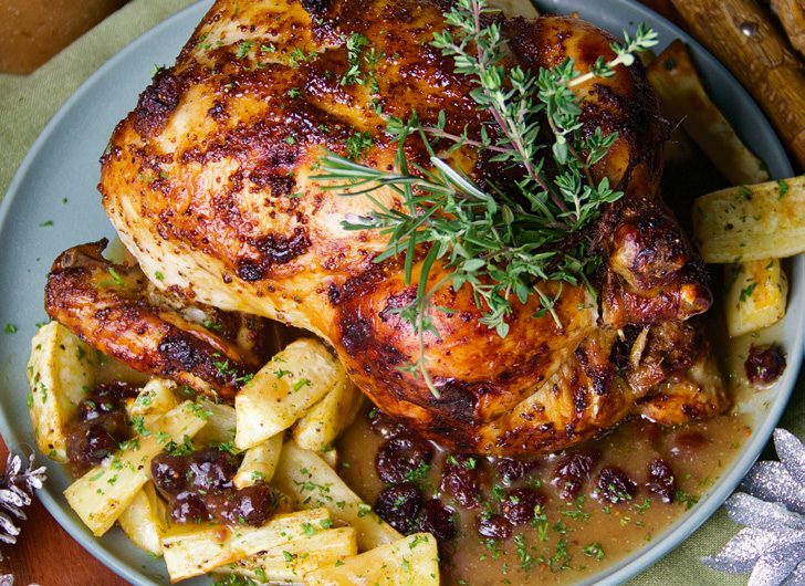 CRANBERRY AND HAZELNUT STUFFED CHICKEN WITH ROASTED PARSNIPS AND CRANBERRY GRAVY