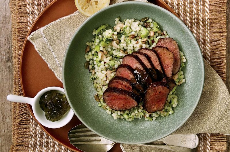 LAMB BACKSTRAP WITH GIANT COUSCOUS, CANNELLINI BEANS, BROCCOLI AND MINT JELLY