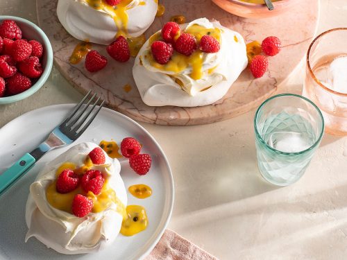 Individual Pavlovas with Passionfruit Curd and Raspberry Cream